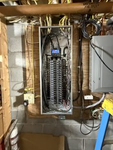 Completed electrical panel view with the cover removed.