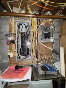Before-view of a 200 amp service panel before upgrade in Caledonia NY